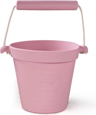 Hele roosa silikoonist rannämbri BIGJIGS TOYS