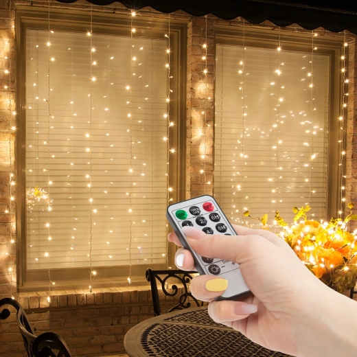 Light curtain with 100 warm white LEDs and remote control