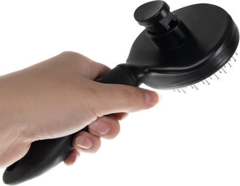 Self-cleaning button for quick hair removal