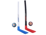 Children's hockey sticks with pucks for a hockey tournament