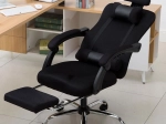 Swivel armchair with footrest and headrest – black